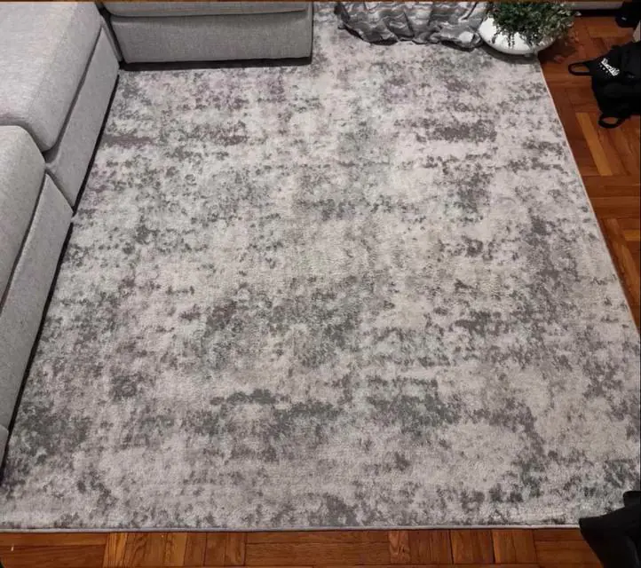 After cleaning: gray distressed-pattern rug