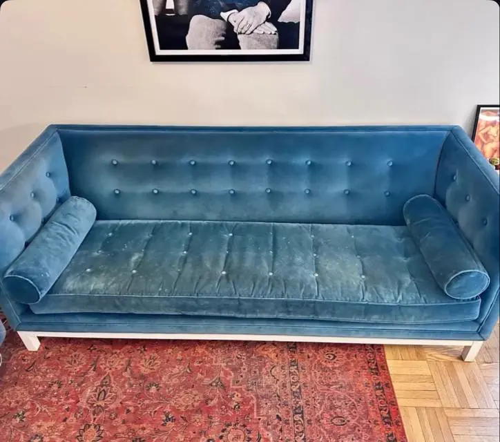 Before cleaning: teal velvet sofa