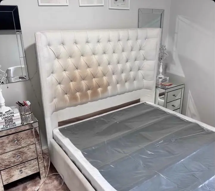 Before cleaning: tufted upholstered headboard